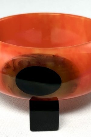 SZ25 Shultz orange bakelite bangle/double oval dots