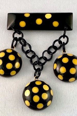 SZ30 Shultz black/white dot dangle pin