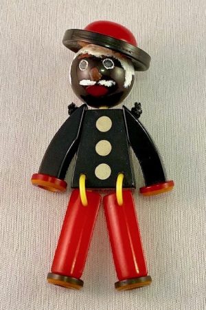 SZ38 Shultz jointed man bakelite pin