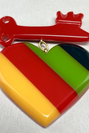 SZ56 Shultz red with laminated stripes bakelite heart/key pin