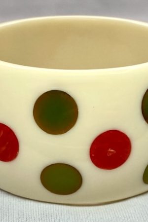 SH86 Shultz bakelite dots on cream lucite bangle