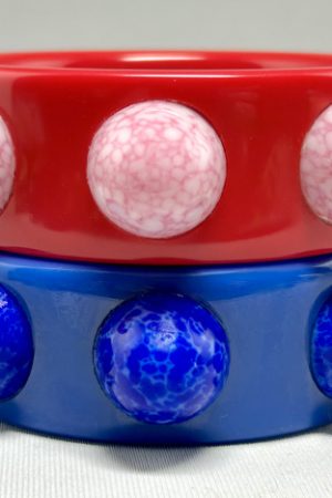 AP11 Blue or red bakelite bangles with glass cabochons