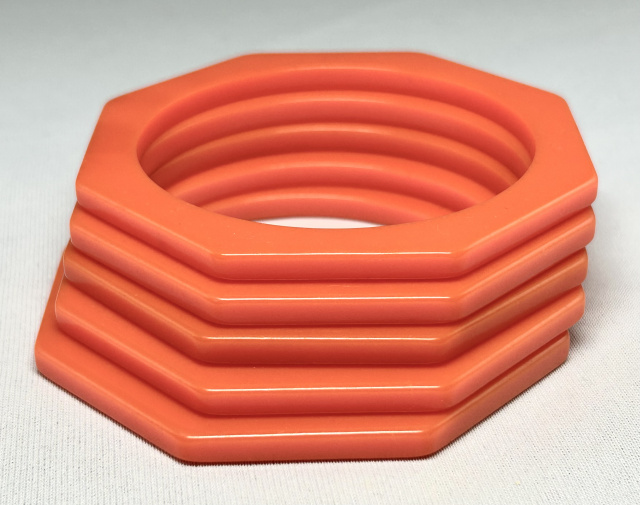 BS58 Stack of 5 orange octagon shaped bakelite spacer bangles