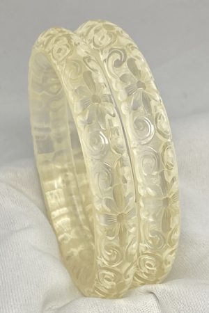 LG225 Pair KJL carved clear acrylic bangles
