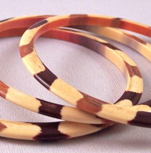 LG322 Set three 60s lucite striped spacer bangles