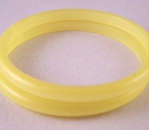 LG325 Pair narrow pale yellow moonglow lucite bangle