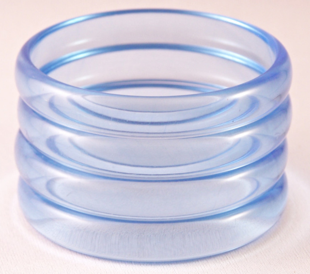 LG211 Set four 60s transparent blue lucite bangle bracelets