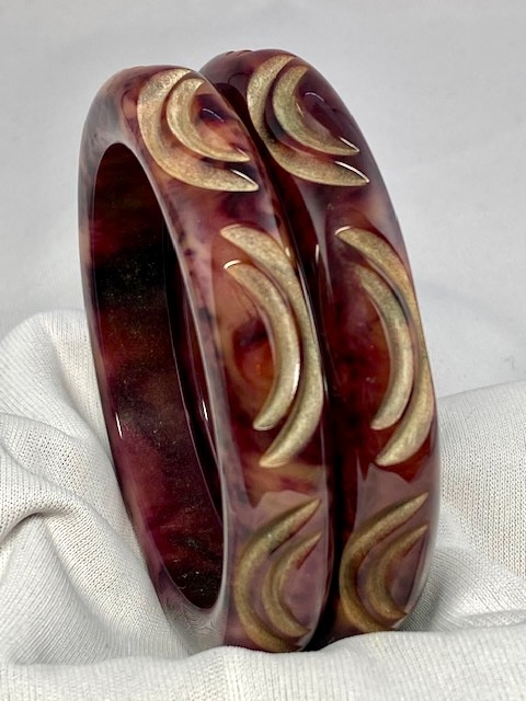 BB371 Pair matching blackberry custard crescent carved bakelite bangles