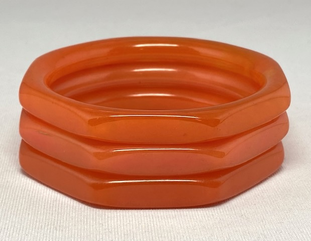 BB556 Semi translucent orange octagon bakelite bangles